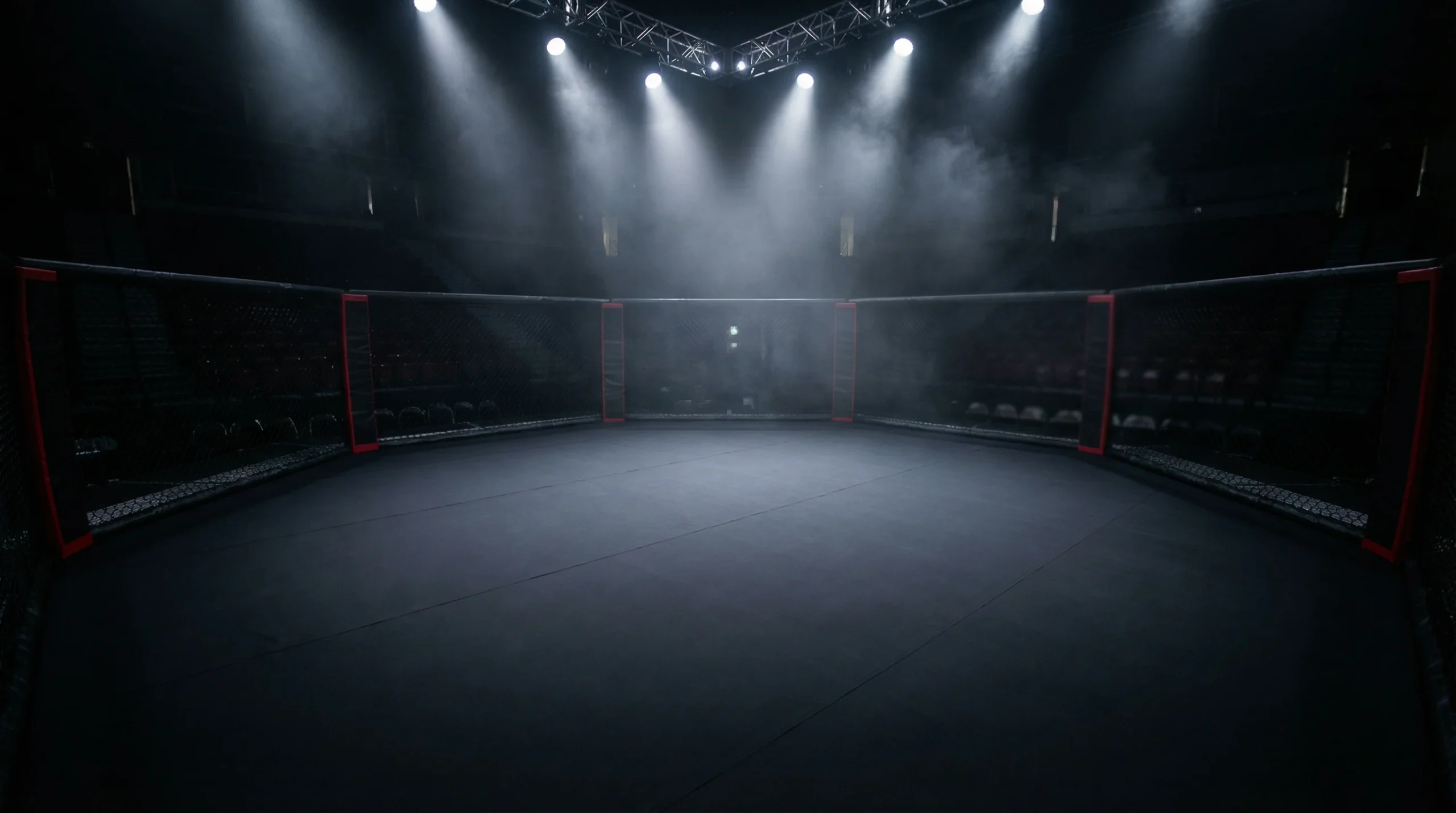 Octágono de MMA iluminado antes de un combate de artes marciales mixtas